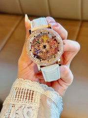 1 Upgraded Version of the Bright Eye-Catching Fashionable Luxury Women's Watch Inlaid with Colorful Rhinestone Quartz Watch, Equipped with Charming Rotating Colorful Snowflake Dial, Stainless Steel Case, Durable Leather Strap