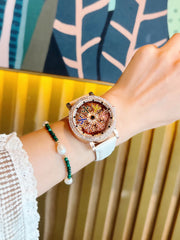 1 Upgraded Version of the Bright Eye-Catching Fashionable Luxury Women's Watch Inlaid with Colorful Rhinestone Quartz Watch, Equipped with Charming Rotating Colorful Snowflake Dial, Stainless Steel Case, Durable Leather Strap