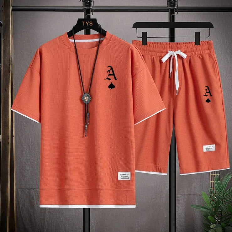 This men's set is a high-quality, fashionable and casual sportswear from Waffger, featuring a short-sleeved T-shirt and outdoor